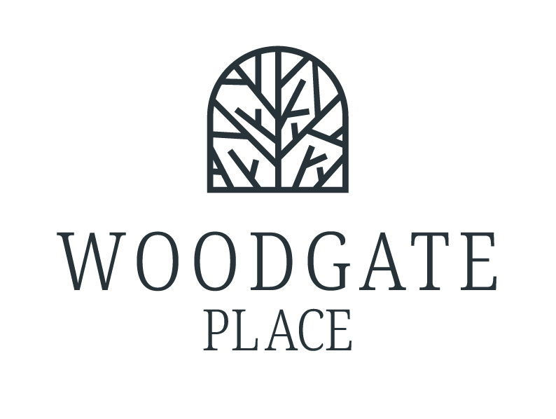 A logo with the text "WOODGATE PLACE" in front of a tree design.
